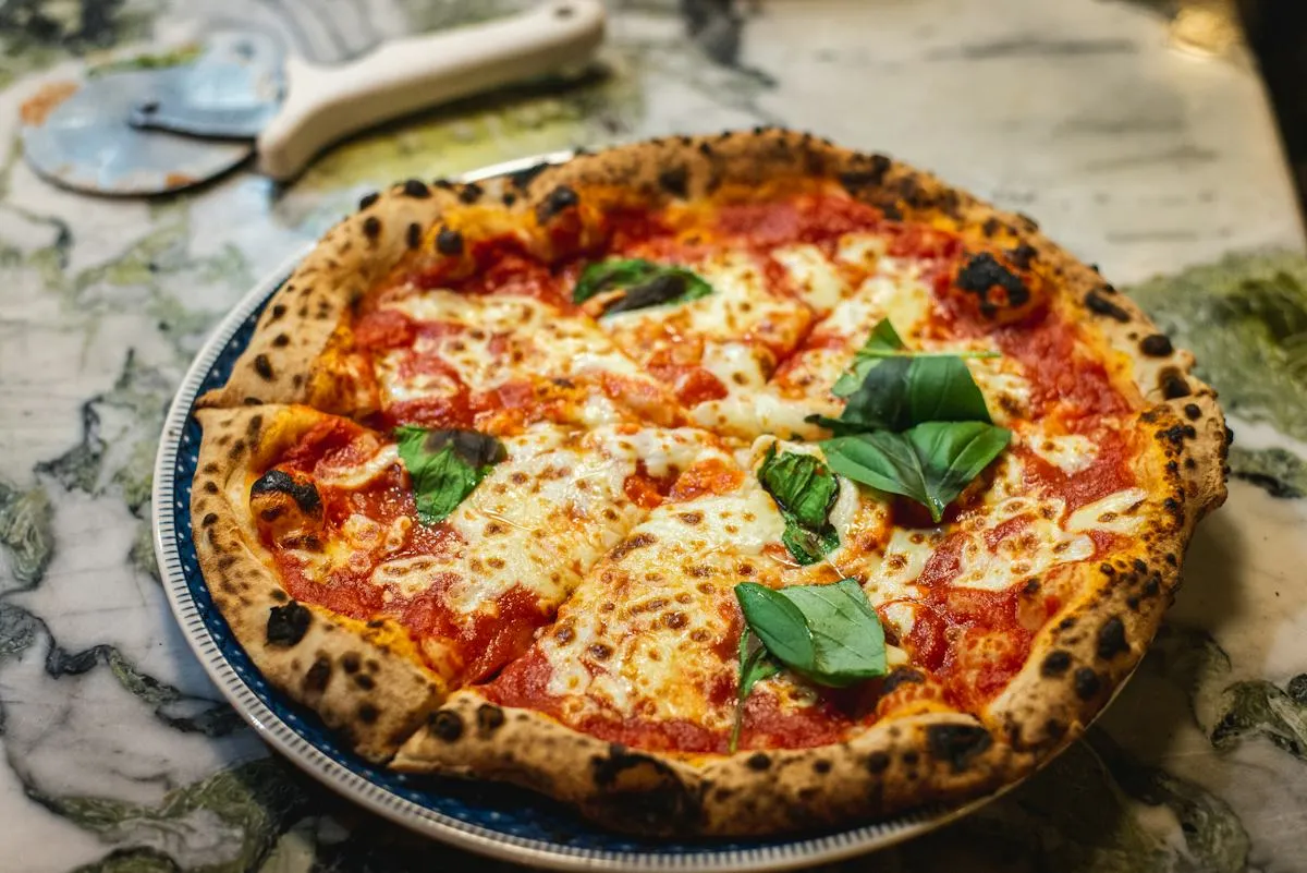 Handmade pizza with fresh toppings