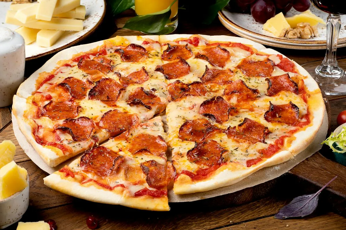 Handcrafted pizza ingredients and restaurant kitchen preparation